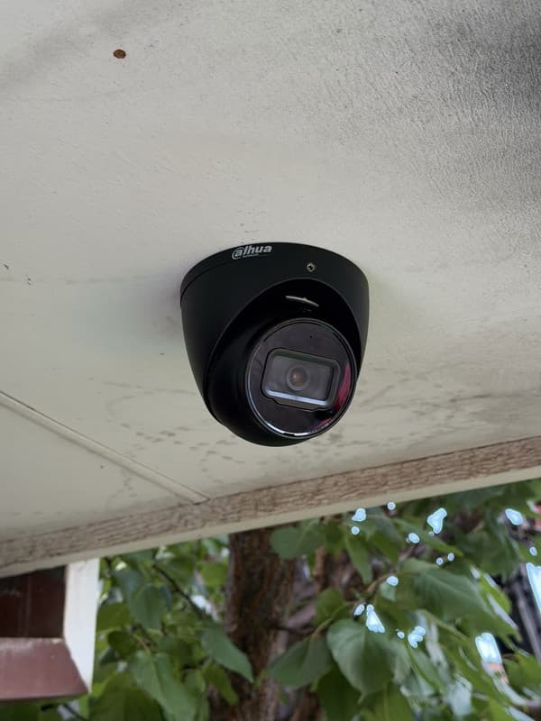 Professionally installed CCTV camera under an eave by Atlas Sec